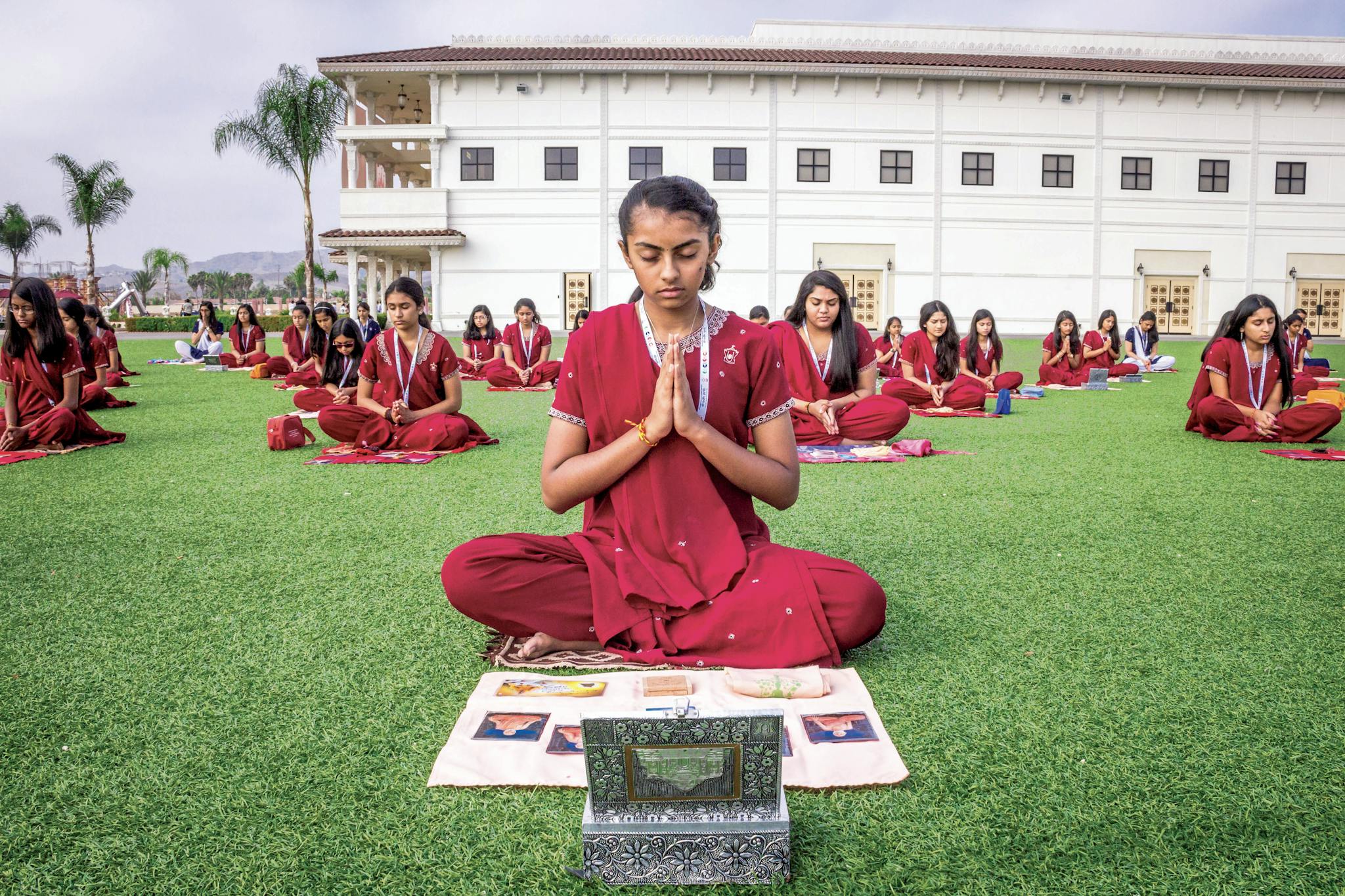 A group of female devotees perform their morning puja together in Chino Hills, California.