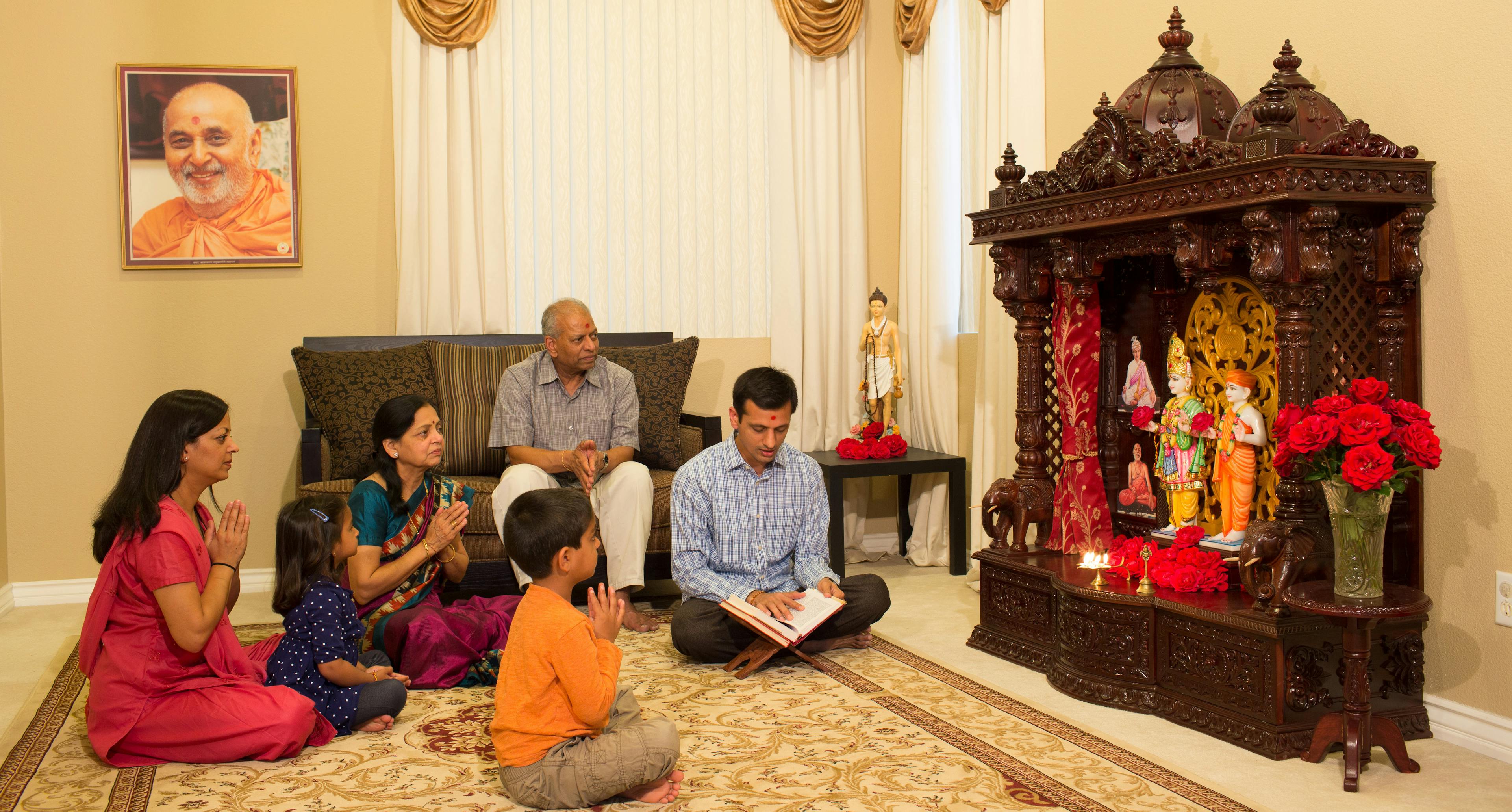A family performs ghar sabha together.