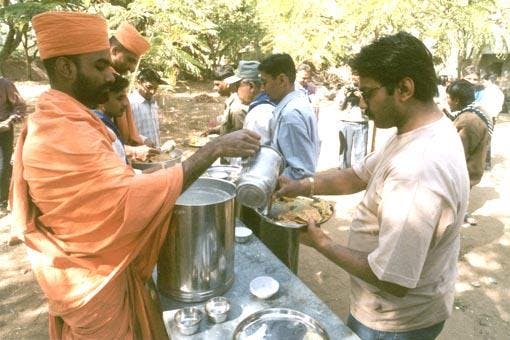 After the massive Gujarat Earthquake of 2001, thousands of BAPS volunteers mobilized to set up relief centers and deliver over 1.8 million hot meals to those affected.