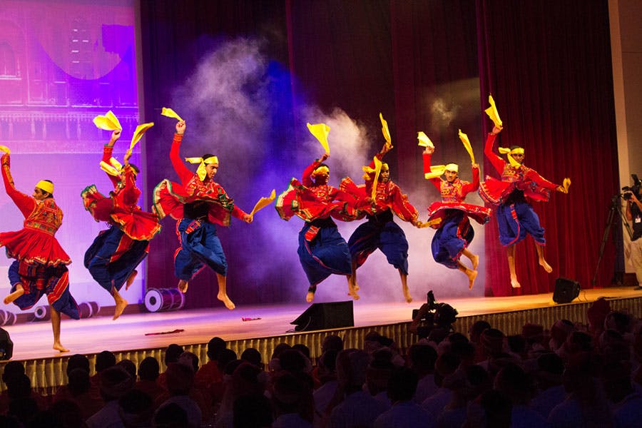 Youths performing a traditional folk dance